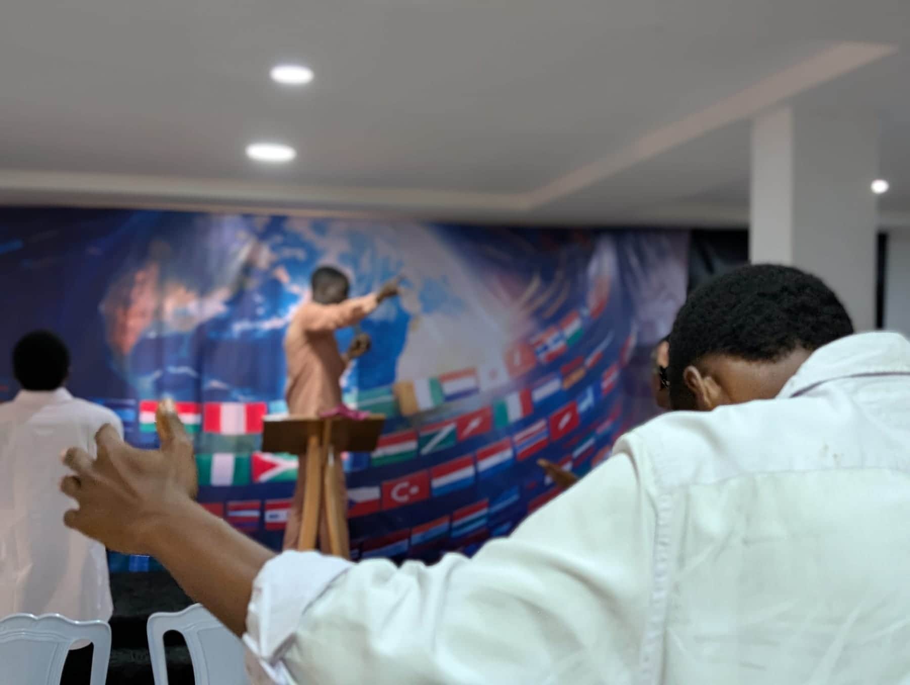 The congregation at prayer, seen from the back of the hall at BLCN