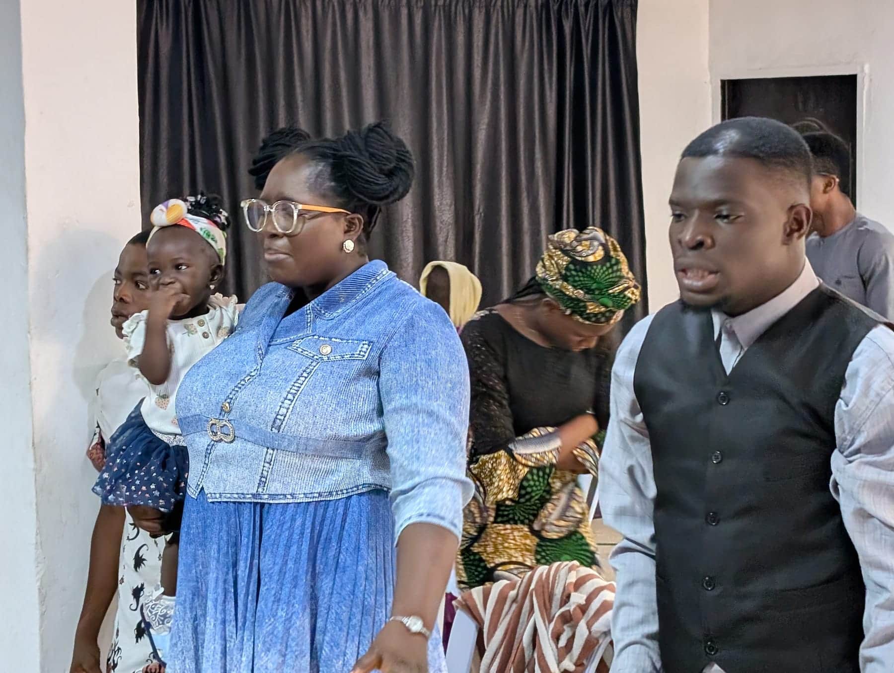 Members of the BLCN family gathered at the front of the church